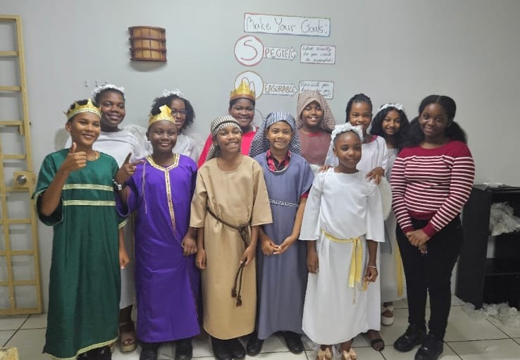 Students in biblical costumes for a drama performance